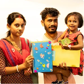 Mother and child showing their artwork